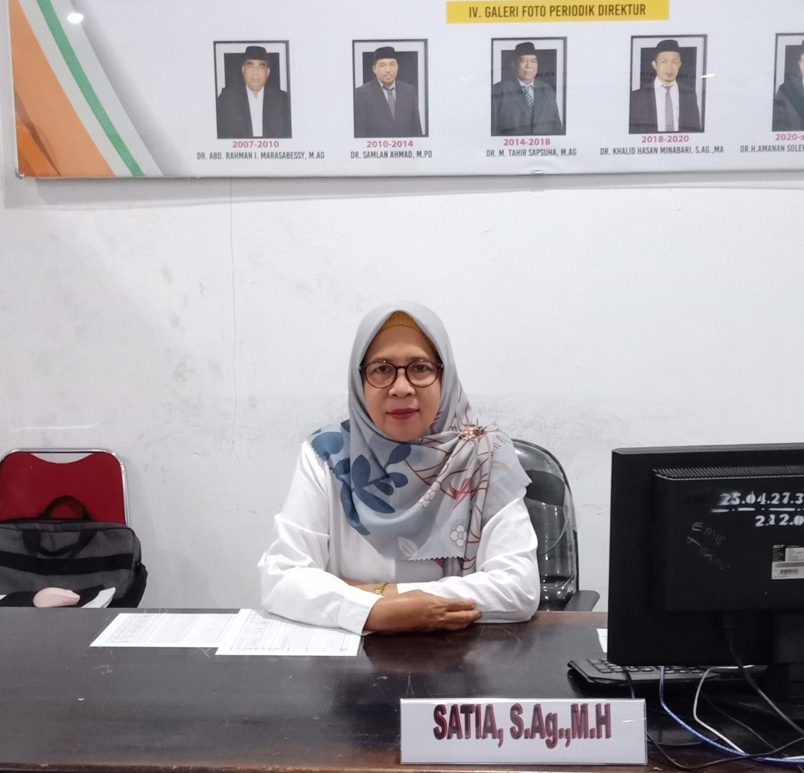Satia, S.Ag., M.H.